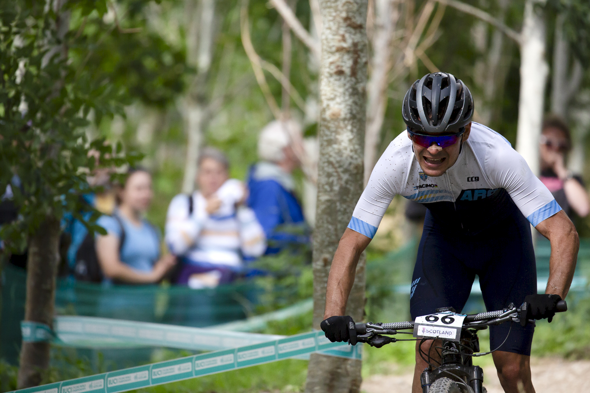 2023 UCI Cycling World Championships - Mountain Bike - Elite Men - Agustin Duran of Argentina nears the edge of the woodland