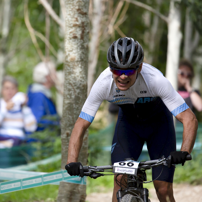 2023 UCI Cycling World Championships - Mountain Bike - Elite Men - Agustin Duran of Argentina nears the edge of the woodland