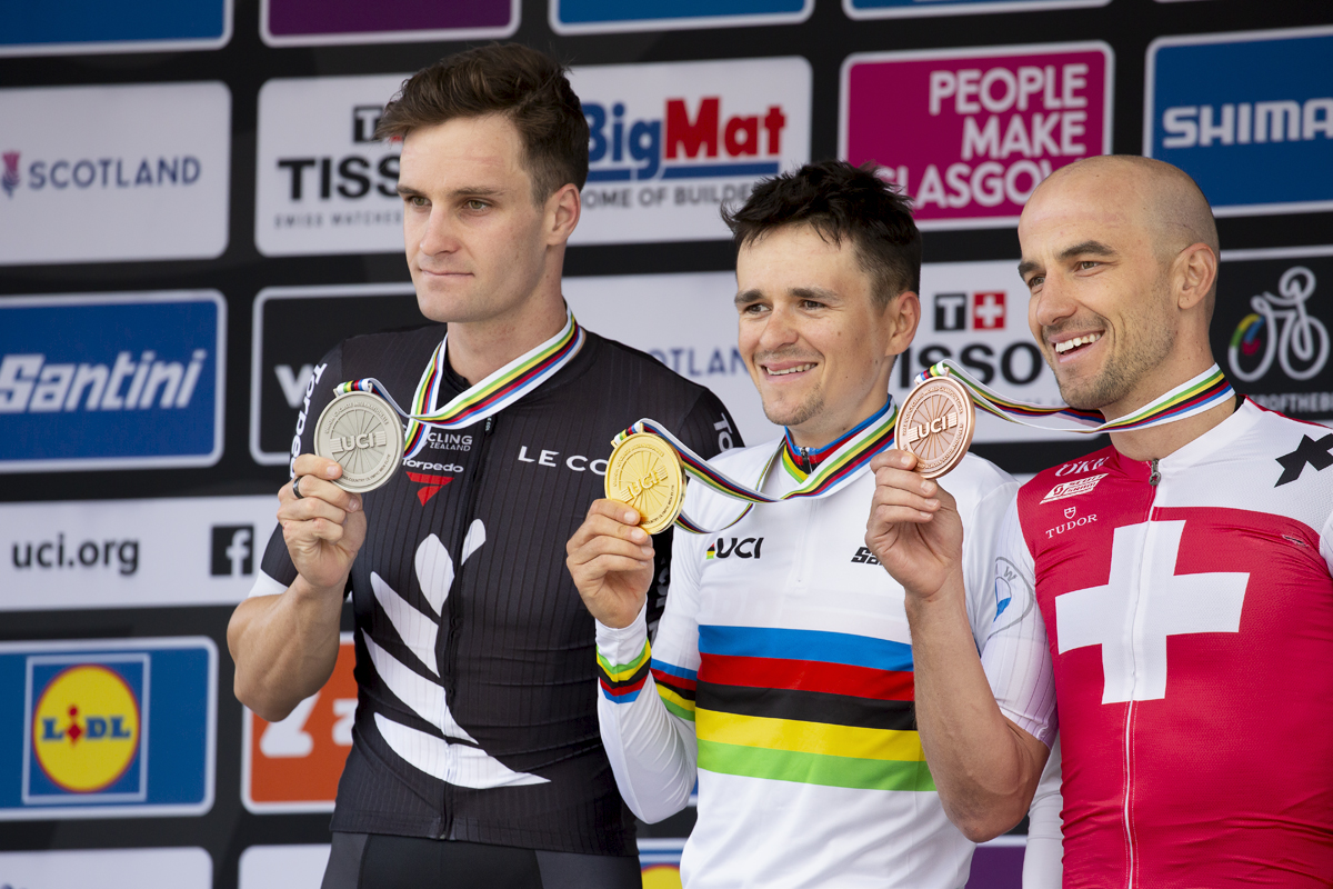 2023 UCI Cycling World Championships - Mountain Bike - Elite Men - Tom Pidcock of Great Britain, Sam Gaze of New Zealand and Nino Schurter of Switzerland show off their medals on the podium