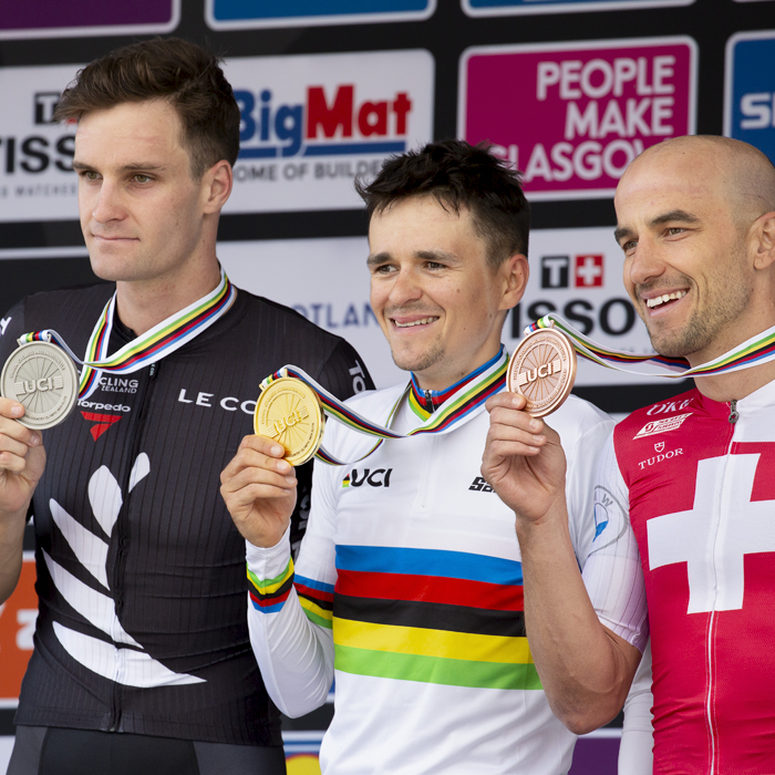 2023 UCI Cycling World Championships - Mountain Bike - Elite Men - Tom Pidcock of Great Britain, Sam Gaze of New Zealand and Nino Schurter of Switzerland show off their medals on the podium