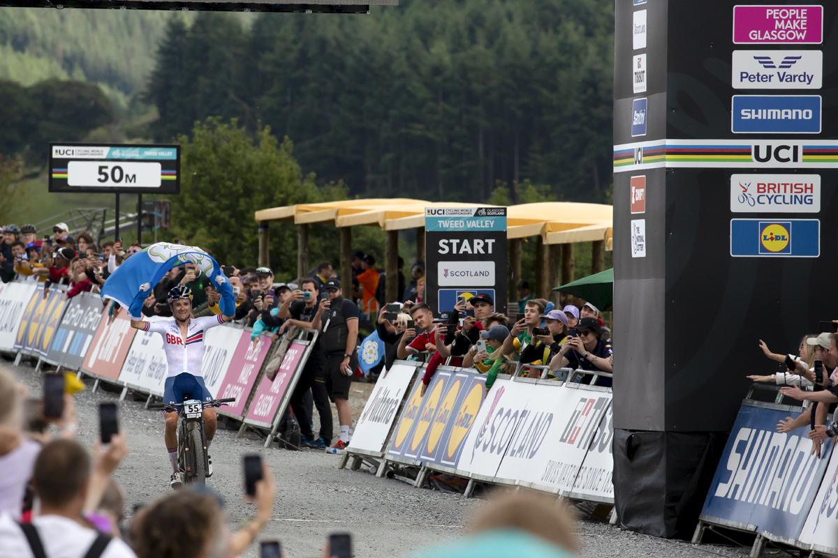 2023 UCI Cycling World Championships - Mountain Bike - Elite Men - Great Britain’s Tom Pidcock raises a Yorkshire flag aloft as he takes the World Championship