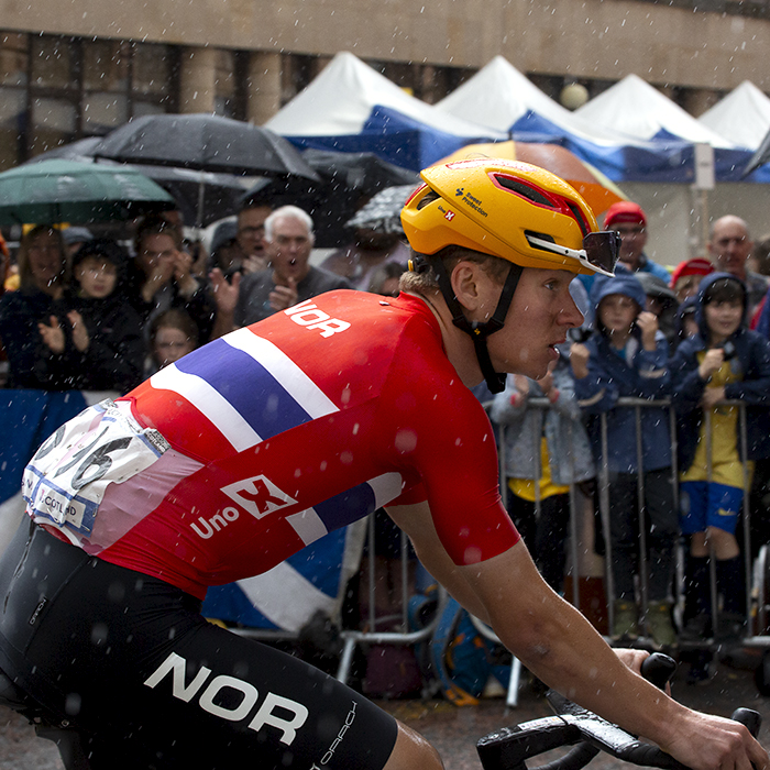 2023 UCI Cycling World Championships - Road Race - Elite Men - Jonas Abrahamsen of Denmark glances up at the hill of Montrose Street as the rain falls