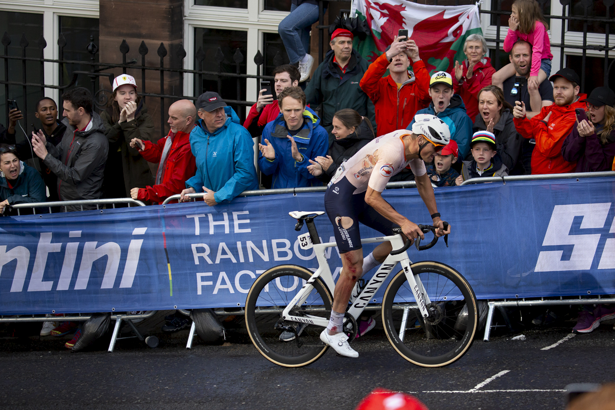 2023 UCI Cycling World Championships - Road Race - Elite Men - Fans roar on Mathieu van de Poel of the Netherlands whose clothes are torn from a recent crash as he climbs Montrose Street