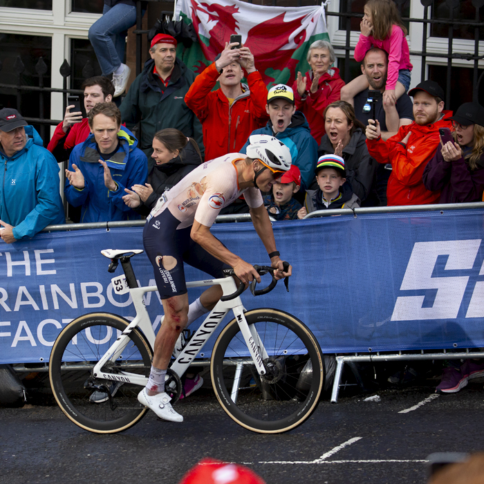 2023 UCI Cycling World Championships - Road Race - Elite Men - Fans roar on Mathieu van de Poel of the Netherlands whose clothes are torn from a recent crash as he climbs Montrose Street