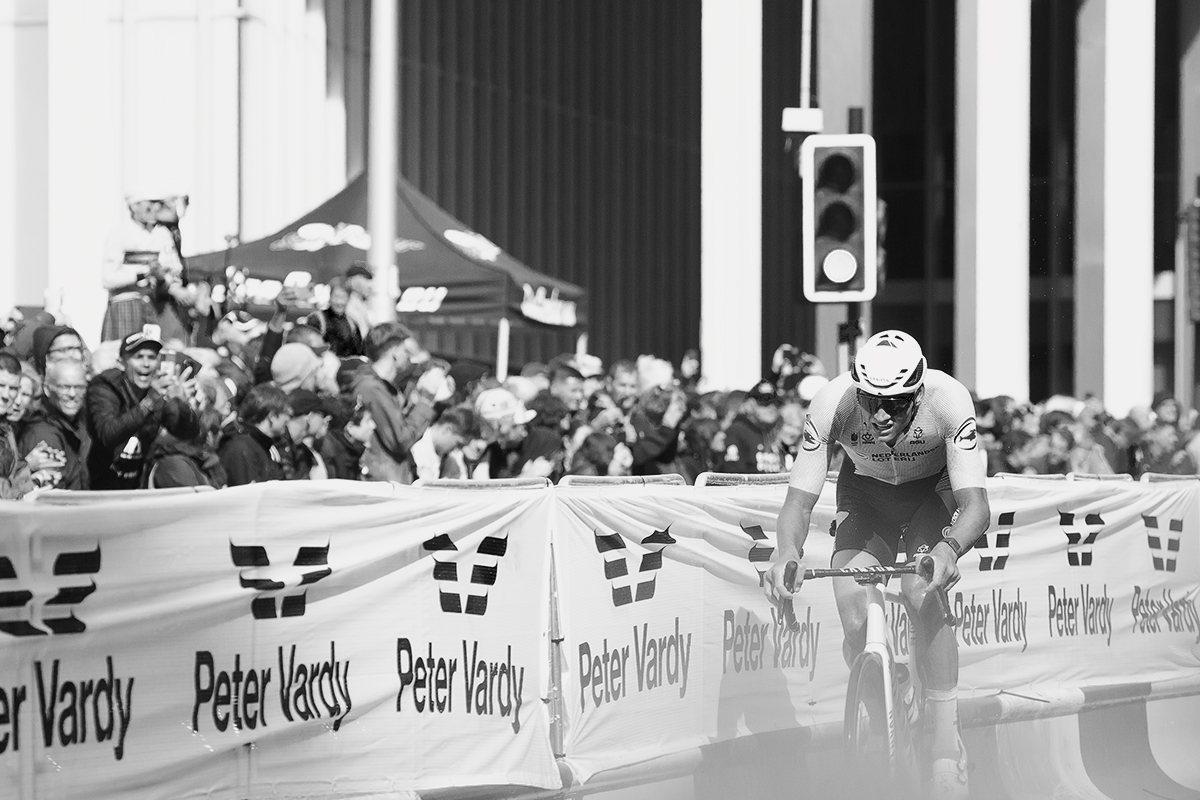 2023 UCI Cycling World Championships - Road Race - Elite Men - Mathieu van de Poel passes advertising hoardings 