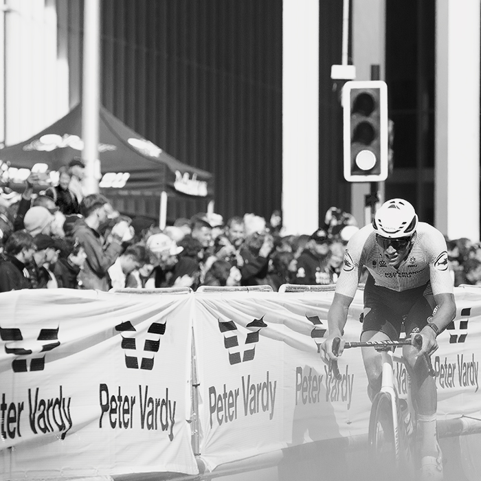 2023 UCI Cycling World Championships - Road Race - Elite Men - Mathieu van de Poel passes advertising hoardings 