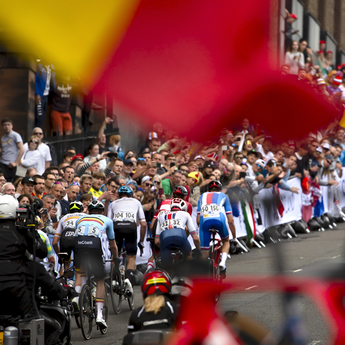 2023 UCI Cycling World Championships - Road Race - Elite Men - A Belgian flag waves as riders ascend Montrose Street