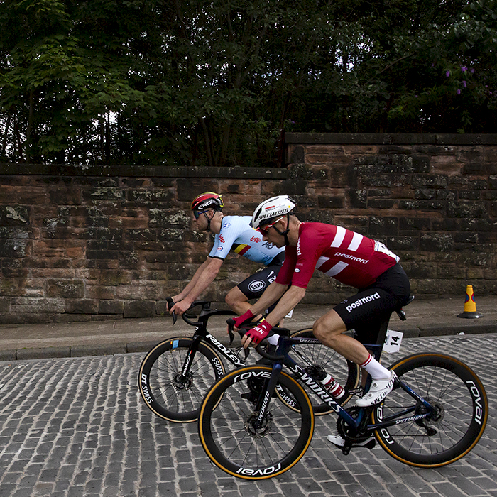 2023 UCI Cycling World Championships - Road Race - Elite Men - Michael Mørkøv of Denmark and Belgium’s Frederik Frison on the cobbles of Rottenrow