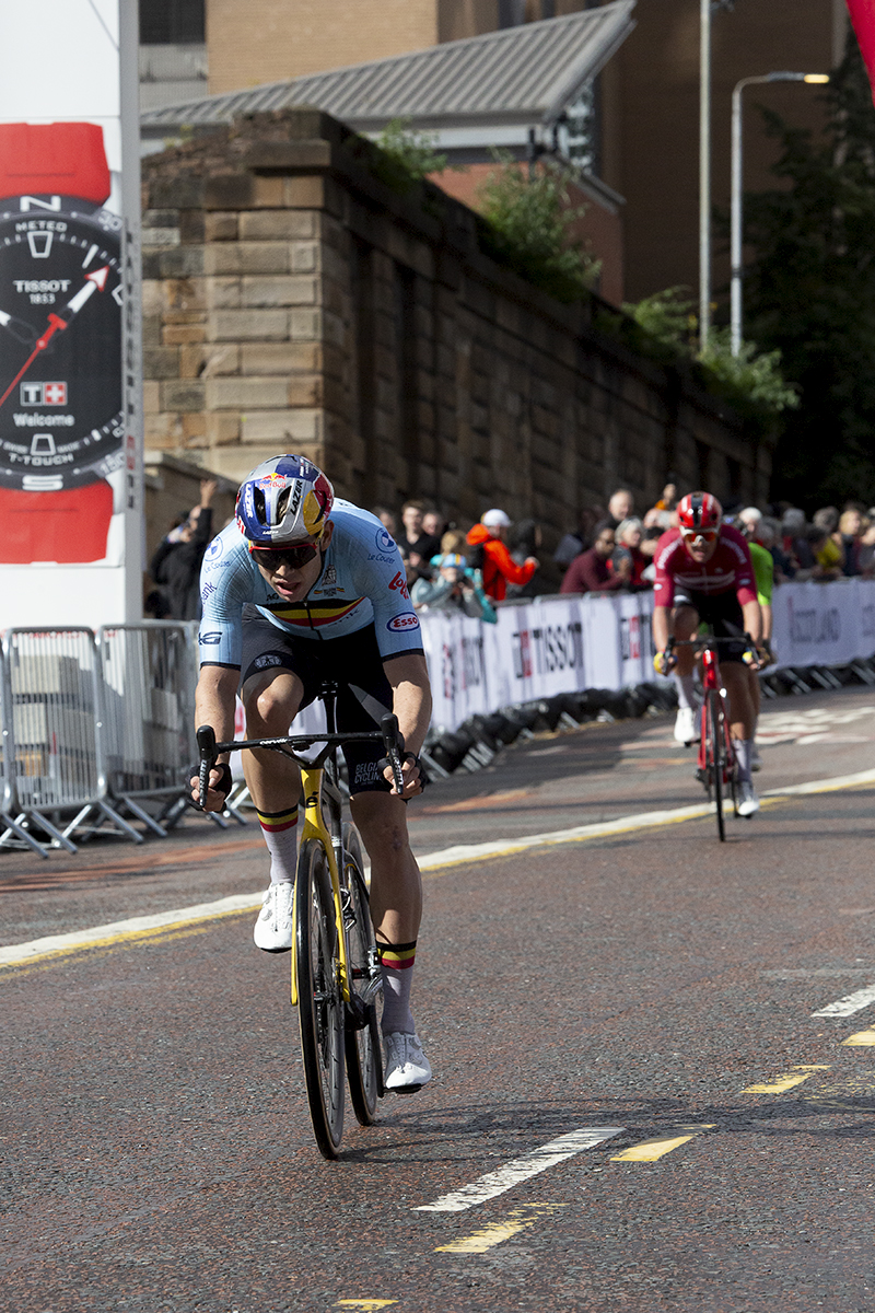 2023 UCI Cycling World Championships - Road Race - Elite Men - Belgium's Wout van Aert passes under the flamme rouge on his way to the finish