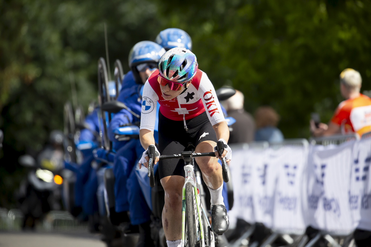 2023 UCI Cycling World Championships - Road Race - Elite Women - Elise Chabbey of Switzerland is followed closely by the neutral support vehicle