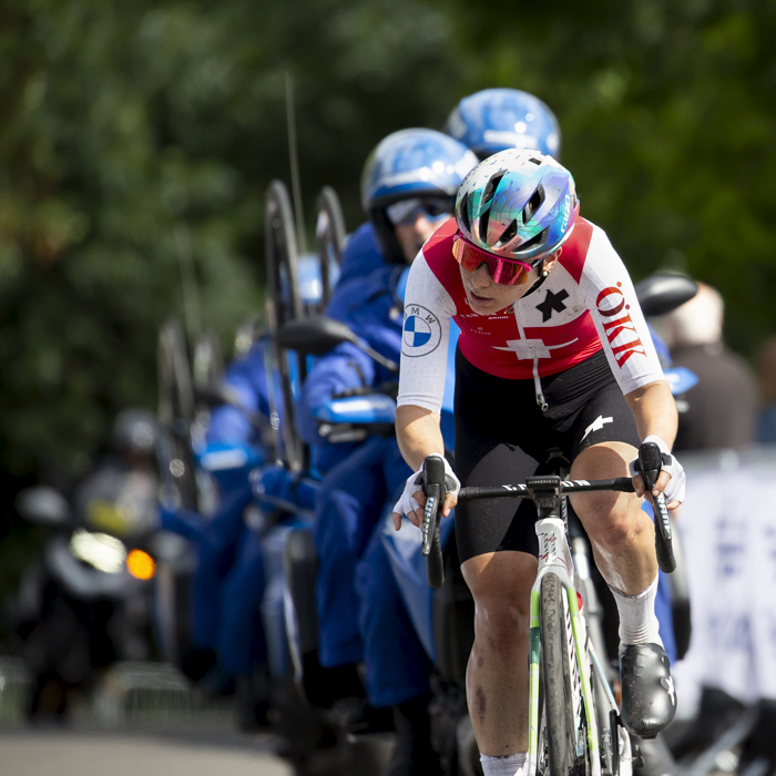 2023 UCI Cycling World Championships - Road Race - Elite Women - Elise Chabbey of Switzerland is followed closely by the neutral support vehicle