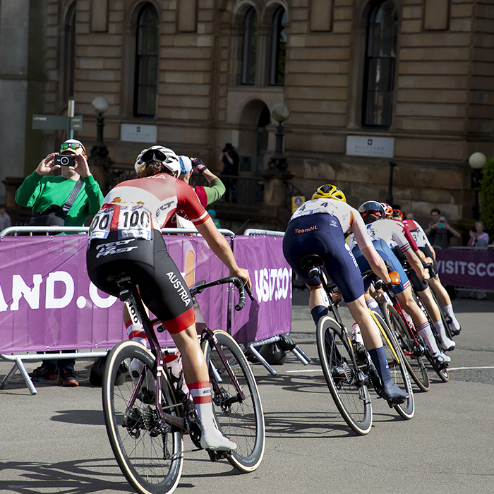 2023 UCI Cycling World Championships - Road Race - Elite Women - A rear view of the riders as they round the corner out of Lynedoch Place