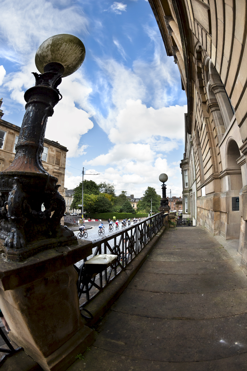 2023 UCI Cycling World Championships - Road Race - Elite Women - The race seen from a balcony with an ornate lamp in the foreground