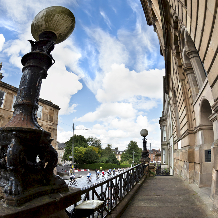 2023 UCI Cycling World Championships - Road Race - Elite Women - The race seen from a balcony with an ornate lamp in the foreground