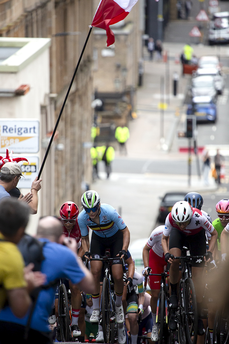 2023 UCI Cycling World Championships - Road Race - Elite Women - Riders push through the crowds at the top of Scott Street