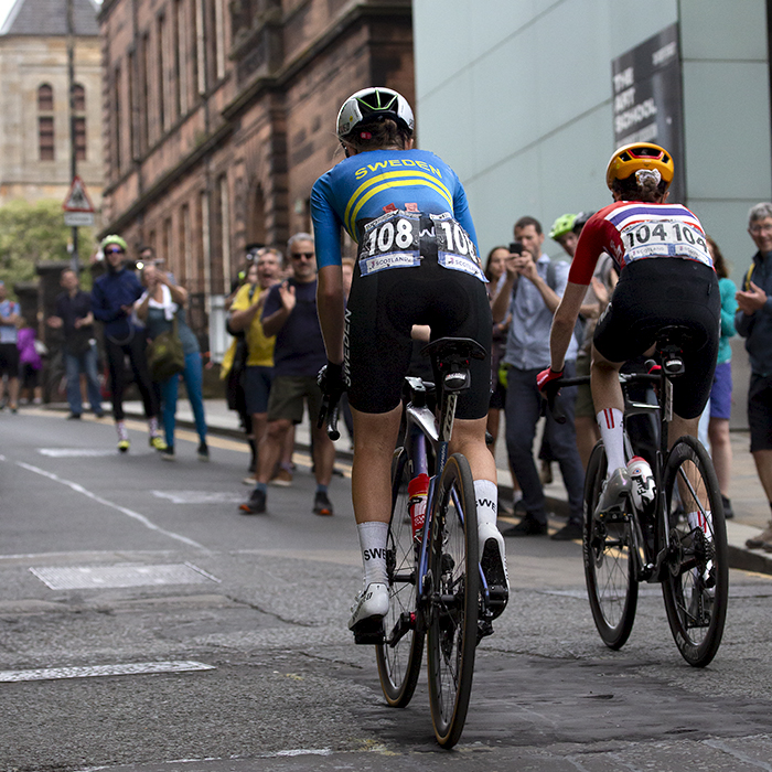 2023 UCI Cycling World Championships - Road Race - Elite Women - Riders pass the Glasgow School of Art on Scott Street