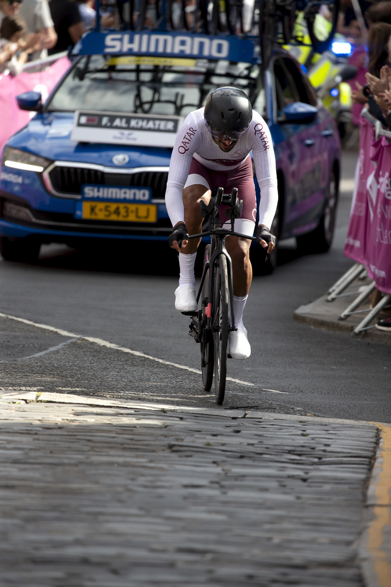 2023 UCI Cycling World Championships - Time Trial - Elite Men - Fadhel Al Khater from Qatar approaches the final section of the course with his support vehicle behind