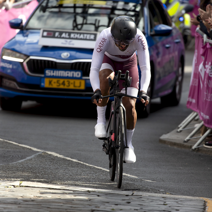 2023 UCI Cycling World Championships - Time Trial - Elite Men - Fadhel Al Khater from Qatar approaches the final section of the course with his support vehicle behind