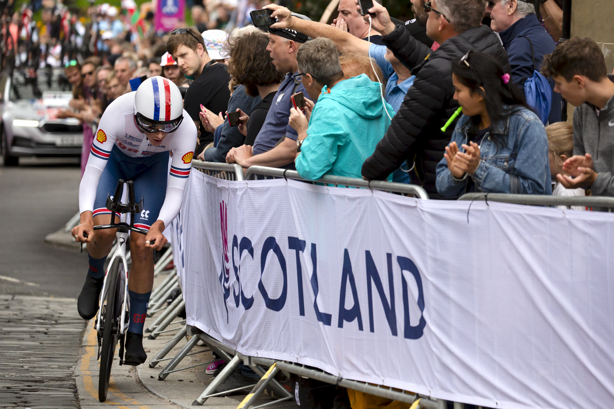 2023 UCI Cycling World Championships - Time Trial - Elite Men - Josh Tarling of Great Britain corners tightly in front of a large crowd