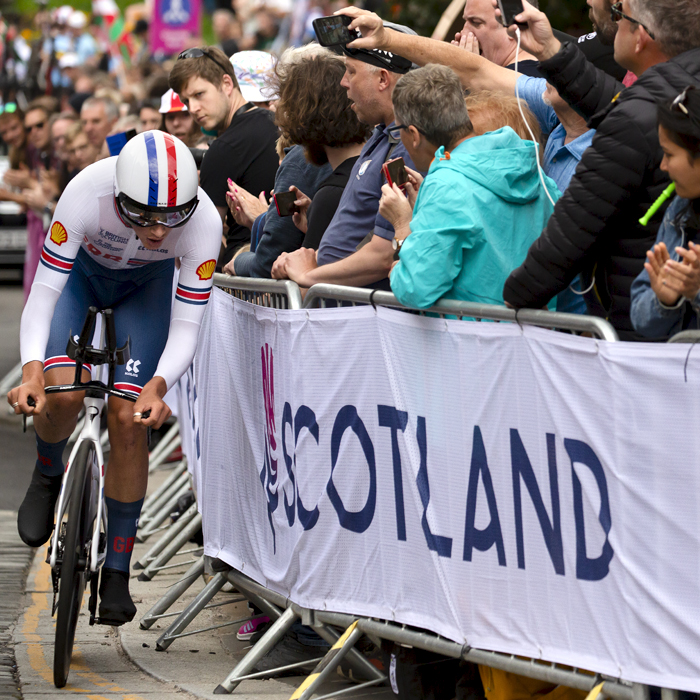 2023 UCI Cycling World Championships - Time Trial - Elite Men - Josh Tarling of Great Britain corners tightly in front of a large crowd