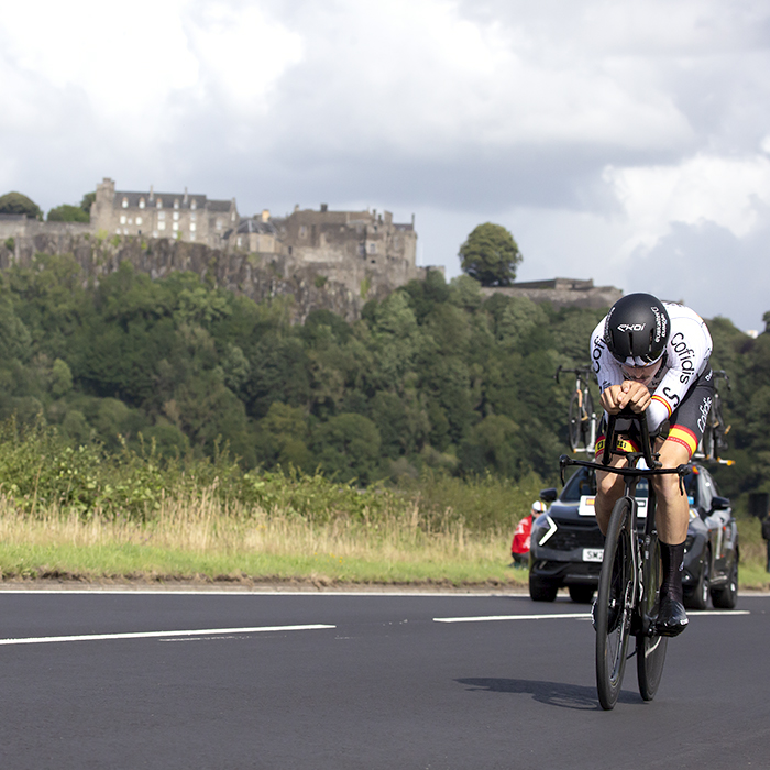 2023 UCI Cycling World Championships - Time Trial - Elite Men - Xabier Mikel Azparren of Spain in an aero tuck with Stirling Castle behind