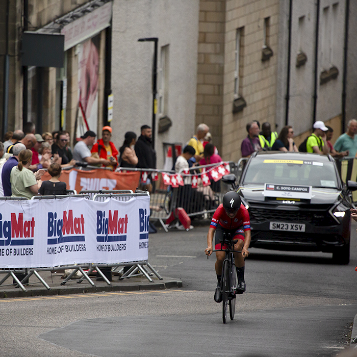 2023 UCI Cycling World Championships - Time Trial - Elite Women -  Catalina Soto Campos of Chile is followed by her support vehicle as she climbs through the streets of Stirling