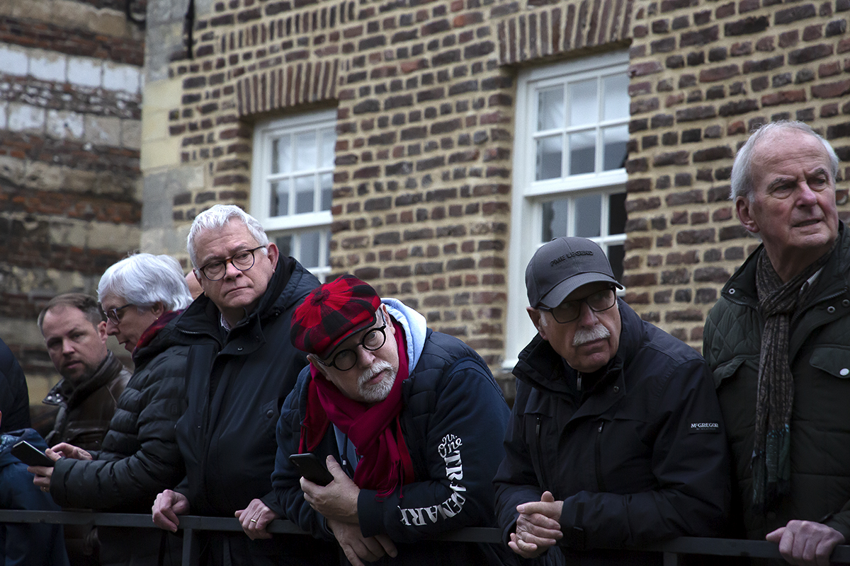 Amstel Gold Race 2023 - A group of older male spectators watch the race pass