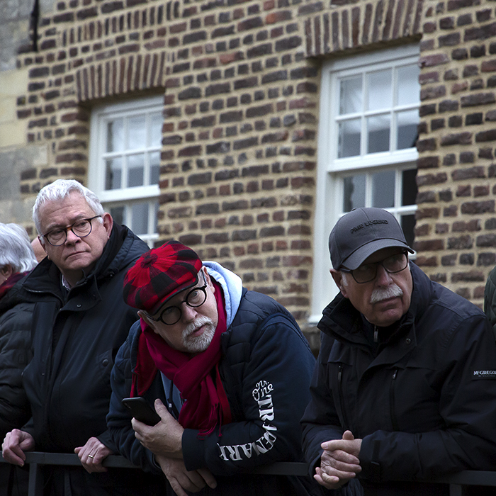 Amstel Gold Race 2023 - A group of older male spectators watch the race pass