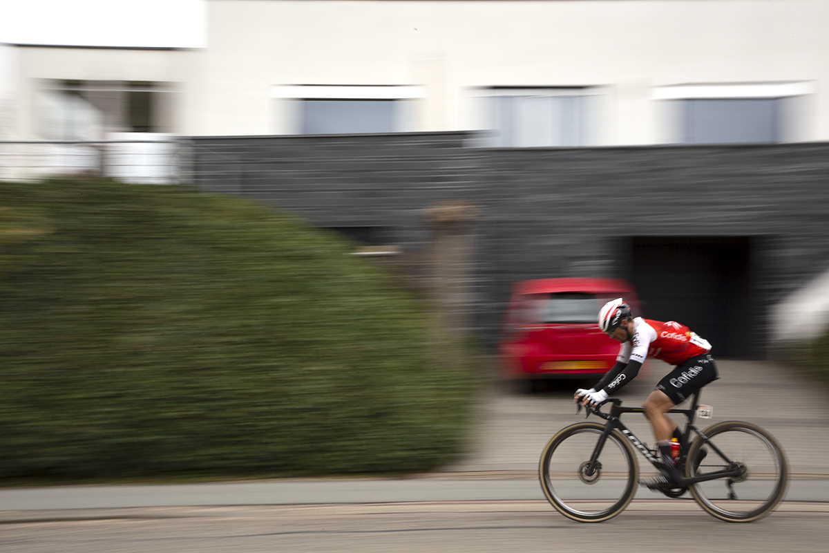 Amstel Gold Race 2023 - Jonathan Lastra of Cofidis passes a house