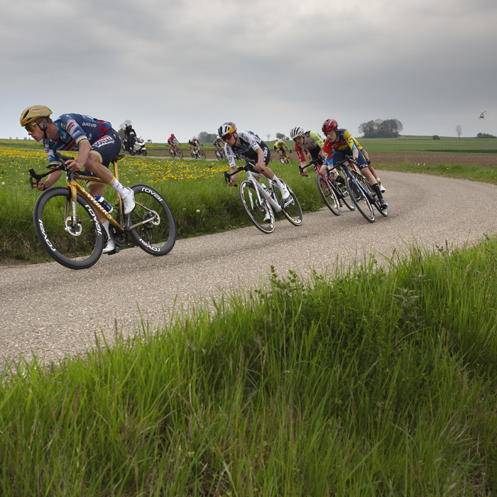 Amstel Gold Race 2025 - Remco Evenepoel & Tom Pidcock bank round a corner during their pursuit of Tadej Pogačar