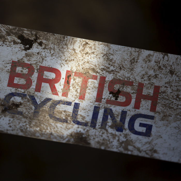 British National Cyclo-Cross Championships 2023 - British Cycling Logo covered in mud on tape surrounding the course