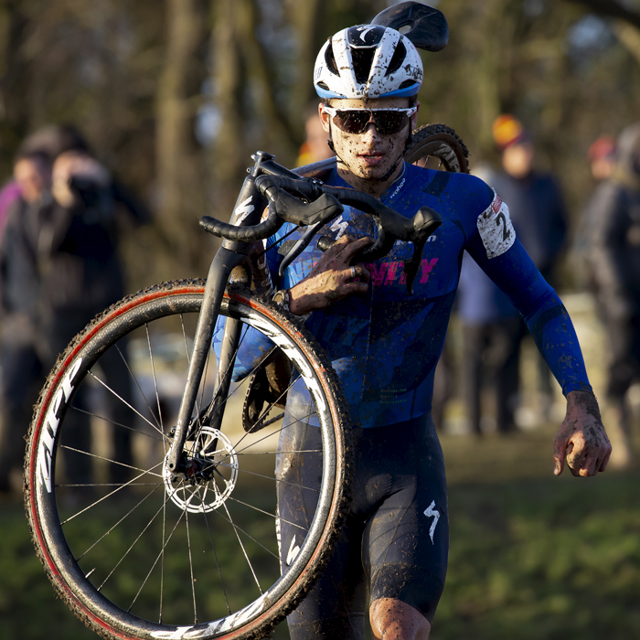 British National Cyclo-Cross Championships 2023 - Cameron Mason runs through a section with his bike on his shoulder