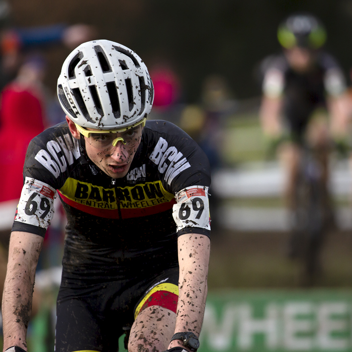 British National Cyclo-Cross Championships 2023 - George Baker is splashed in mud as he completes the hurdles section