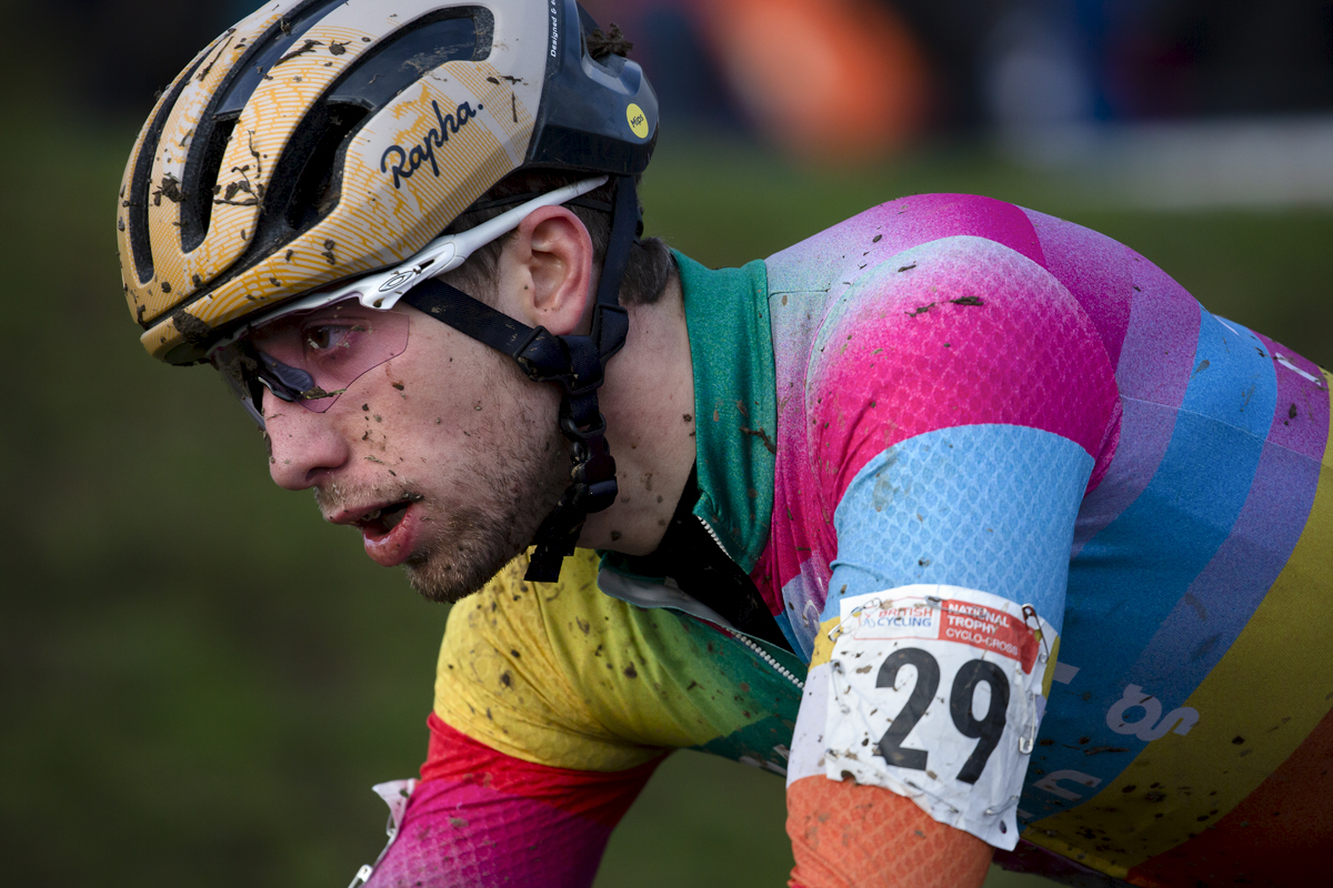 British National Cyclo-Cross Championships 2023 - James Madgwick face splashed with mud takes on the course