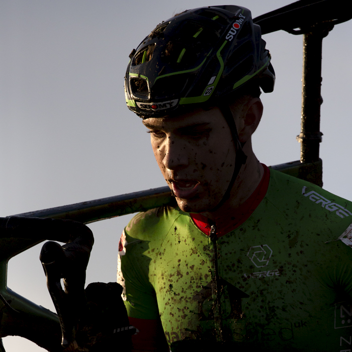 British National Cyclo-Cross Championships 2023 - Jenson Young runs with his bike on his shoulder 