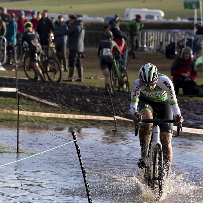 British National Cyclo-Cross Championships 2023 - Millie Couzens rides through a large waterlogged area