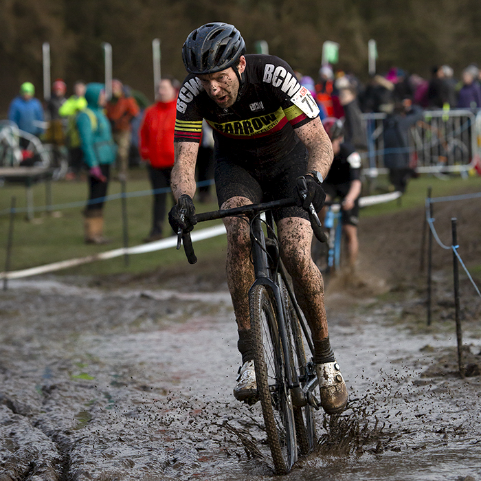 British National Cyclo-Cross Championships 2023 - Richard Morgan cycles through a wet muddy area of the course