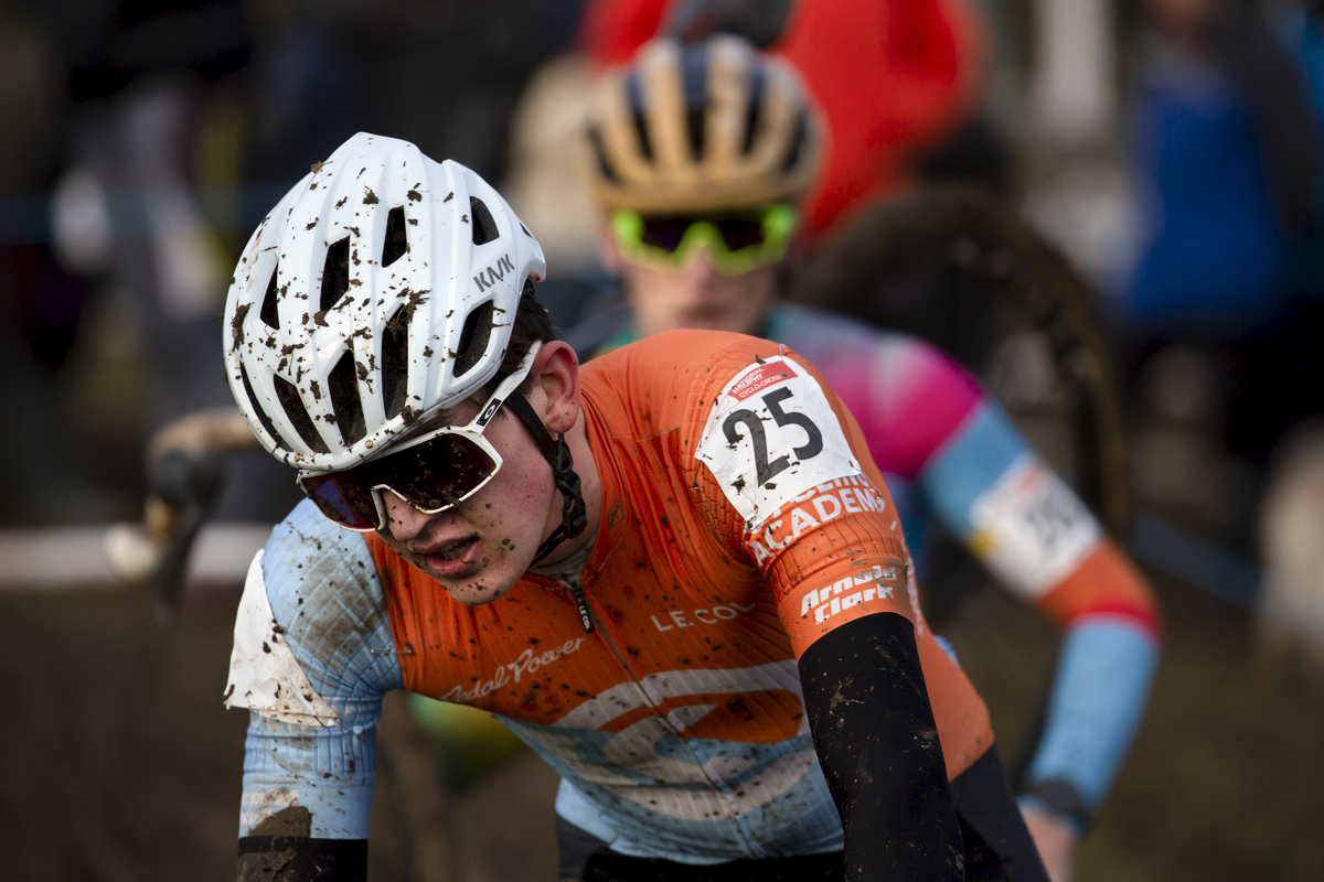 British National Cyclo-Cross Championships 2023 - Sam Chisholm mud on his helmet and shirt tackles the course