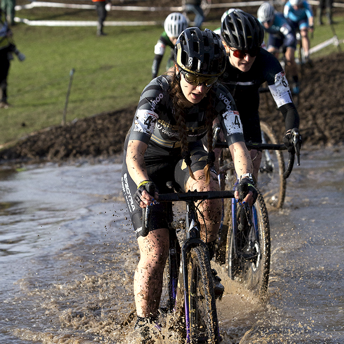 British National Cyclo-Cross Championships 2023 - Xan Crees leads a group of riders through the water