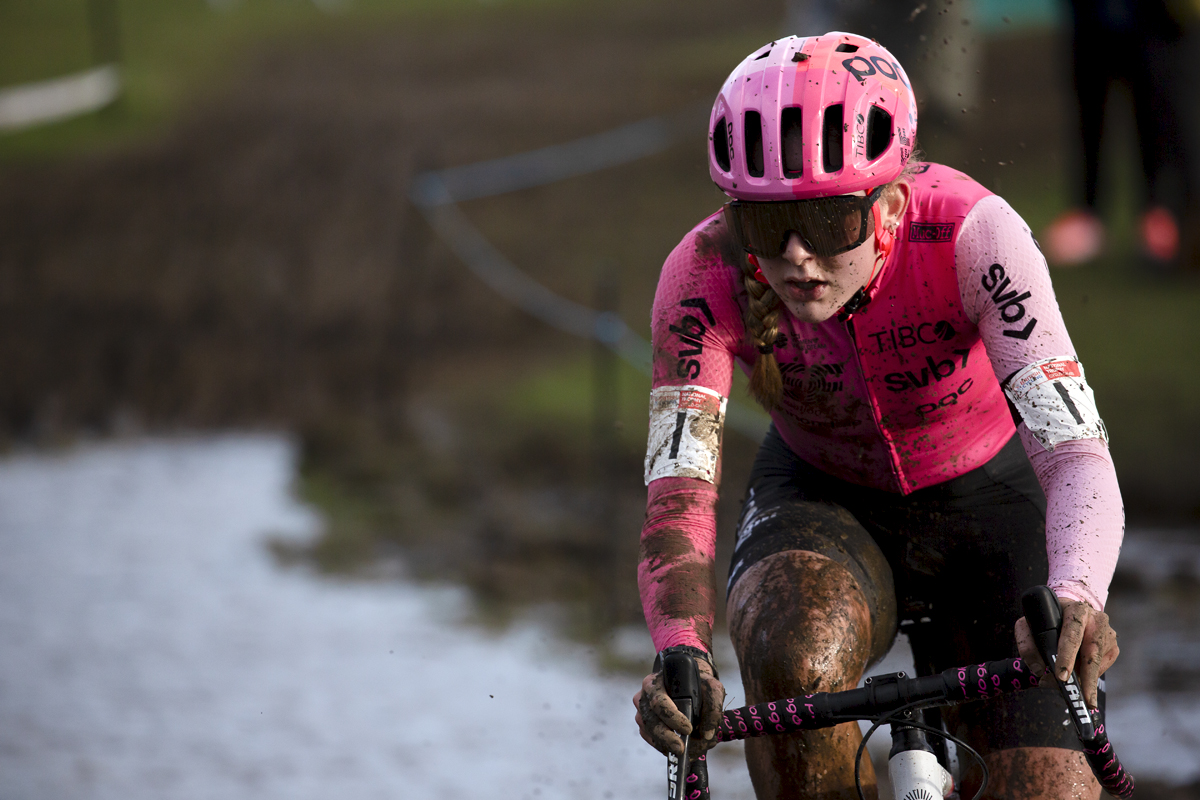 British National Cyclo-Cross Championships 2023 - Zoe Bäckstedt caked in mud from the course as she competes in the event