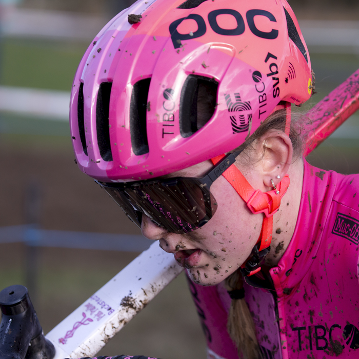 British National Cyclo-Cross Championships 2023 - Close up of Zoe Bäckstedt and she carries her bike through a muddy section