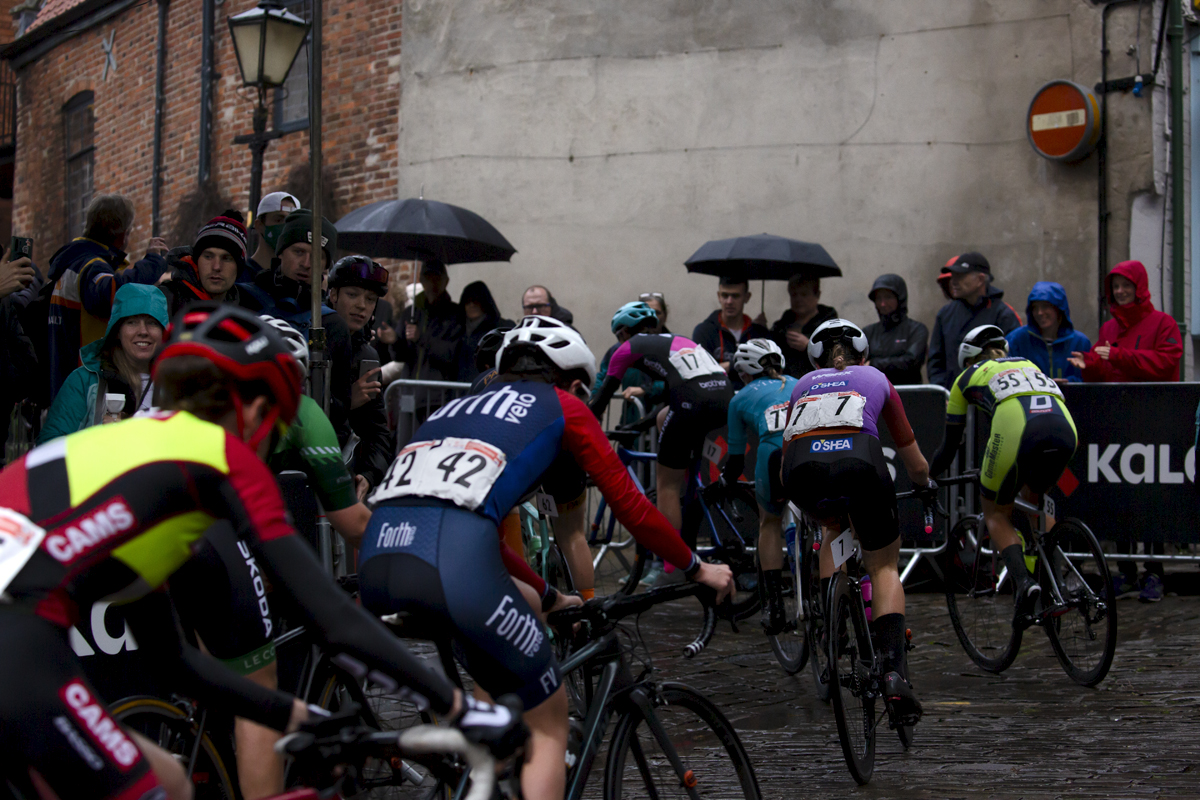 British National Road Championships 2021 - Women’s Road Race - Fans shelter under umbrellas as the race passes by