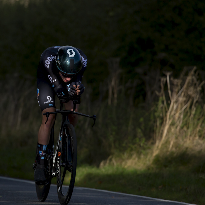 British National Road Championships 2021 - Men’s U23 Time Trial - Leo Hayter of Development Team DSM moves through the shadows cast by the hedgerows during the event