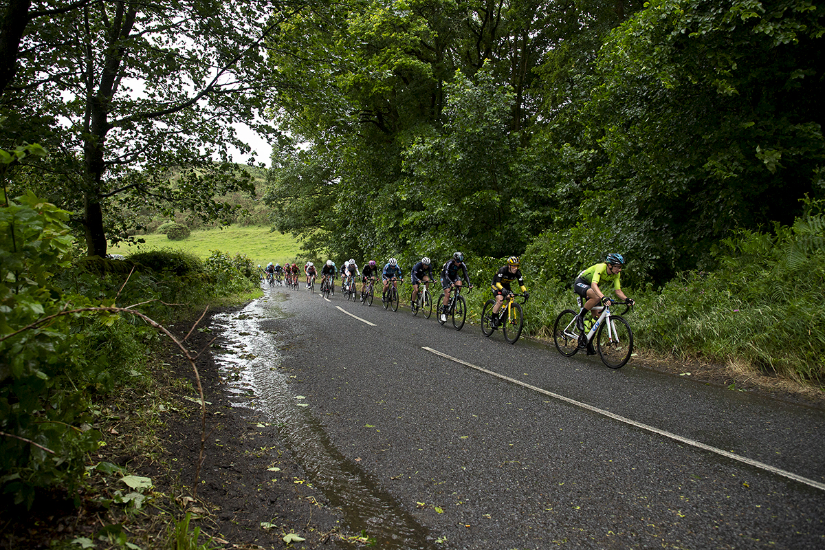 British National Road Championships 2022 - Women’s Road Race - A Strung out peloton ascend a hill