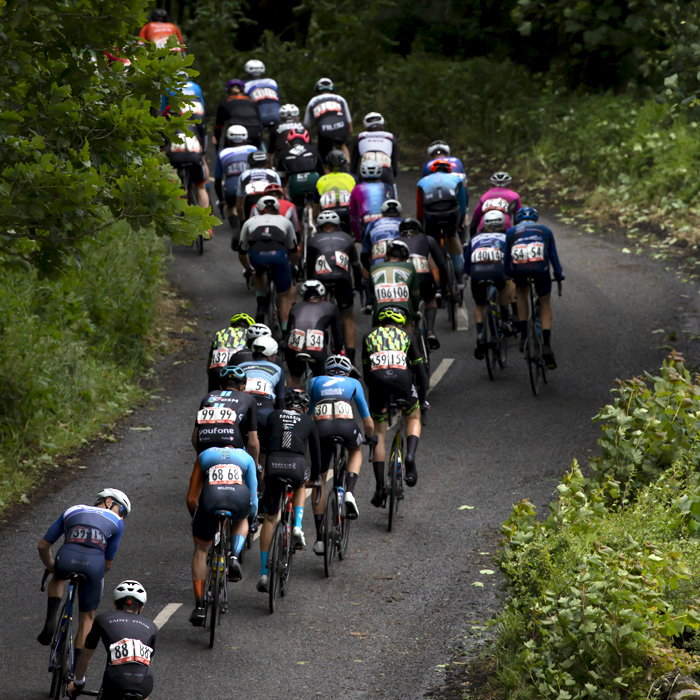 British National Road Championships 2022 - Men’s Road Race - Rear view of the riders tackling the hill climb