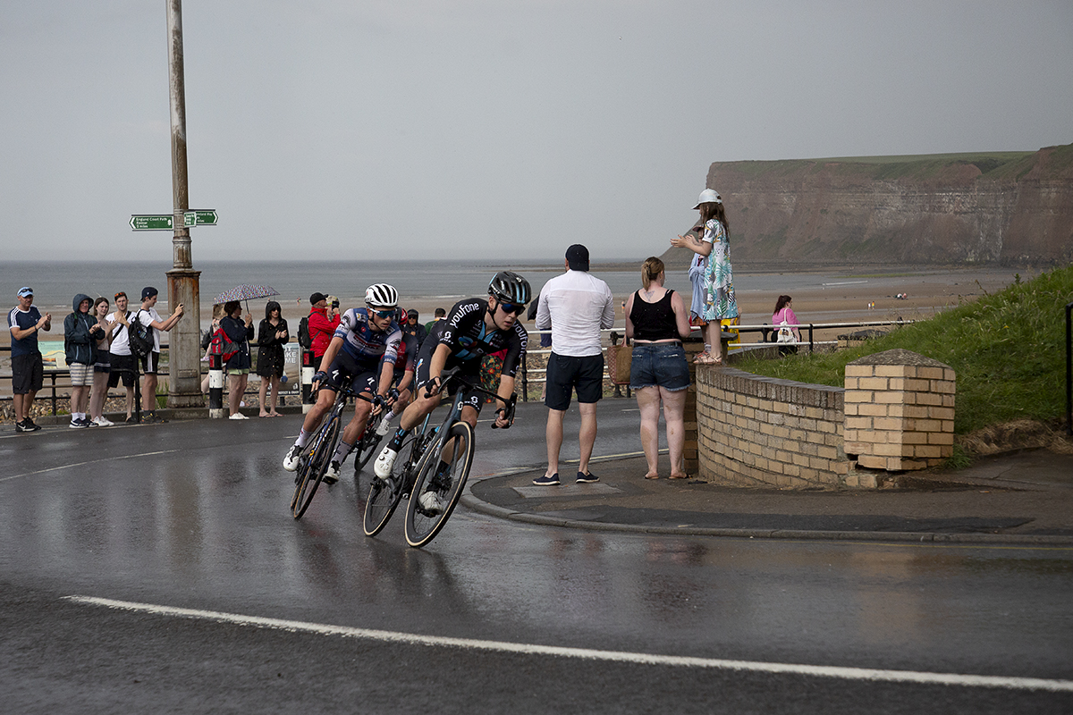 British National Road Championships 2023 - Men’s Road Race - Sean Flynn of Team DSM leads a group up a wet hill climb