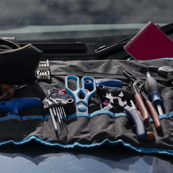 British National Road Championships 2023 - Time Trial - A bag of tools set out on the bonnet of a car