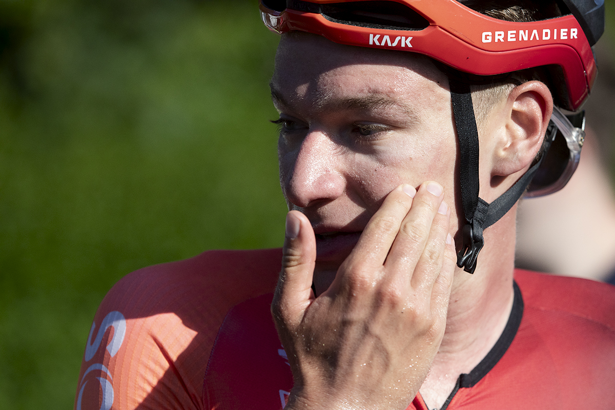 British National Road Championships 2024 - Men’s Road Race - Ethan Hayter wipes his face with his hand after winning the road race