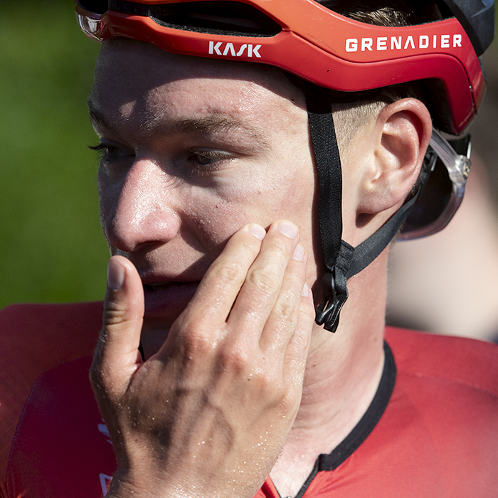 British National Road Championships 2024 - Men’s Road Race - Ethan Hayter wipes his face with his hand after winning the road race