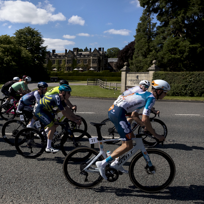 British National Road Championships 2024 - Men’s Road Race -The peloton passes by the front of Gisborough Hall